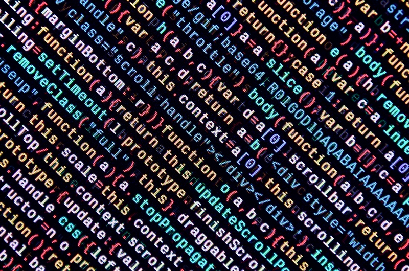 Javascript functions, variables, objects. Monitor closeup of function source code. IT specialist workplace. Big data and Internet of things trend. HTML website structure. Website programming code